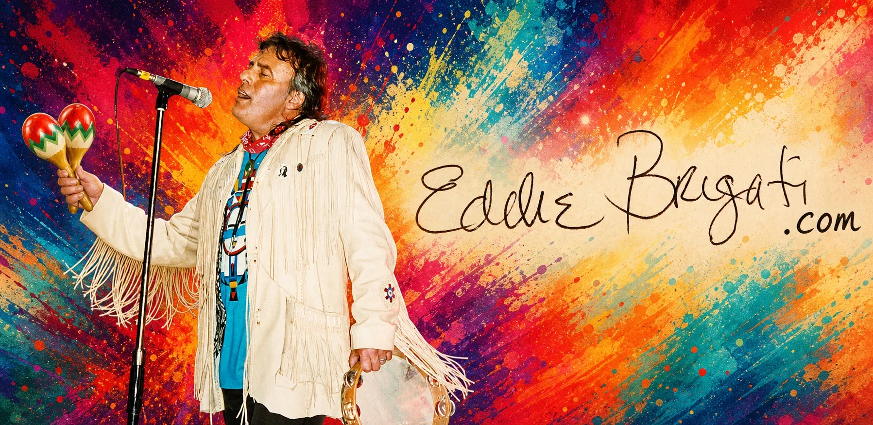 Eddie Brigati singing into a microphone, shaking maracas, in a fringed white jacket, against a vivid multicolour paint-splash background, with “Eddie Brigati.com” hand-lettered across the open space to his right.
